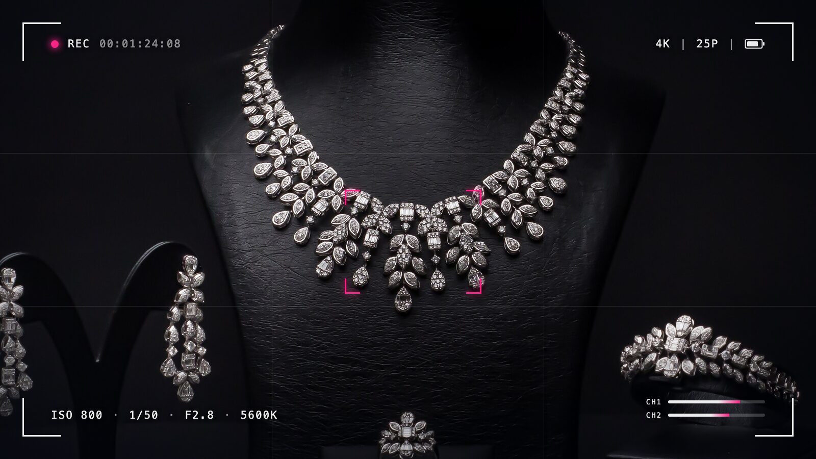 Camera viewfinder framing a diamond necklace during a Vivid Media jewellery product shoot